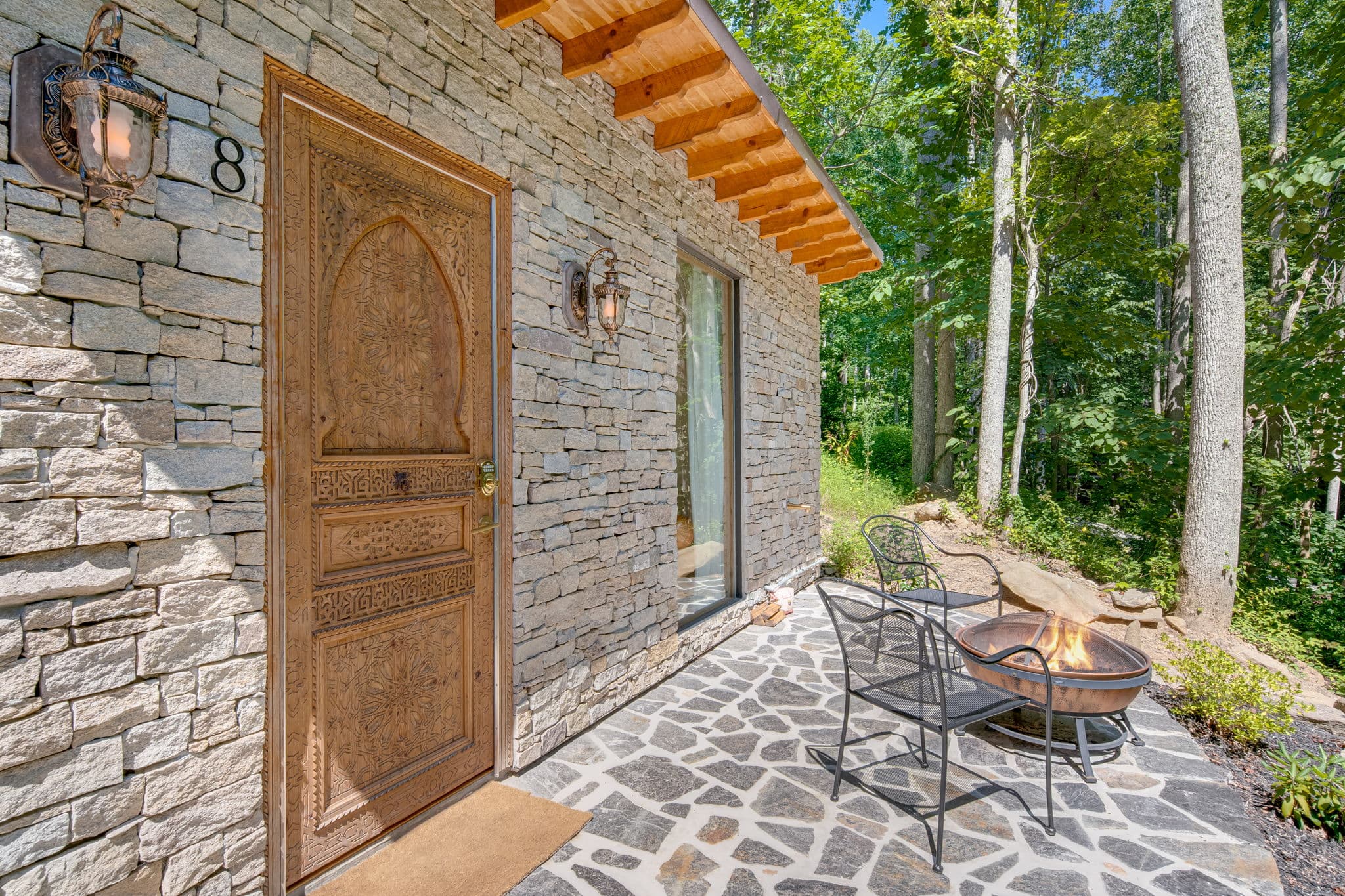 Cottage surrounded by forest
